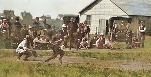 Early Baseball Game with Old Car