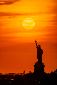 Sun Setting Over Lady Liberty