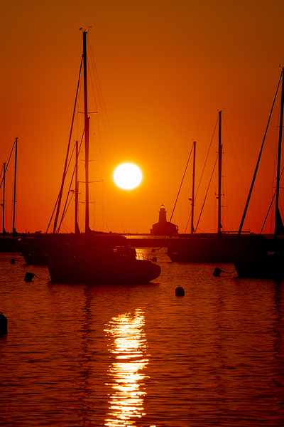 Sunrise over Chicago Harbor by Geoffrey Prior