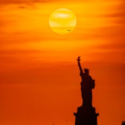 Sun Setting Over Lady Liberty