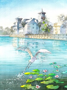 A heron flies over the Celebration hotel in Florida