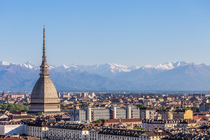 Turin Italy   Mole Antonelliana landmark with Alps mountains in