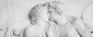 Ancient sculpture with kissing couple Florence - Italy