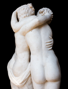 Togetherness emotion. Statue of two people embracing with passio