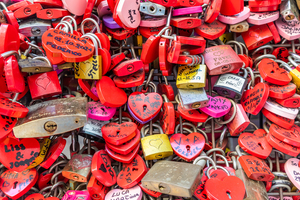 Verona Italy - June 2022: background of heart-shaped locks on a