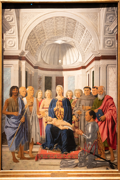 Madonna and child with saints angels and Federico da Montefeltr Print