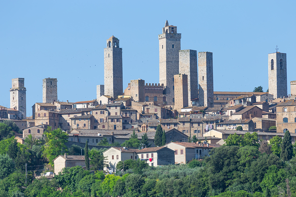 San Gimignano village Italy: green countryside blue sky hill  Print