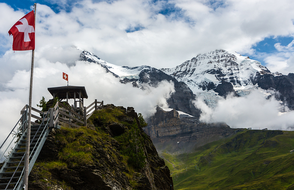 Eiger and Monk in the Clouds - Swiss Alps by Gary Whitton