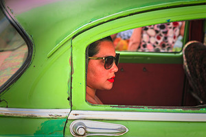 Woman in Green Car Window