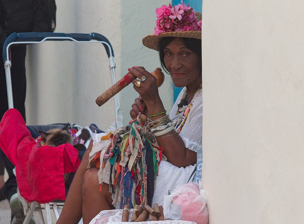 Woman With Cigar by the Wall by Chirag Pandya