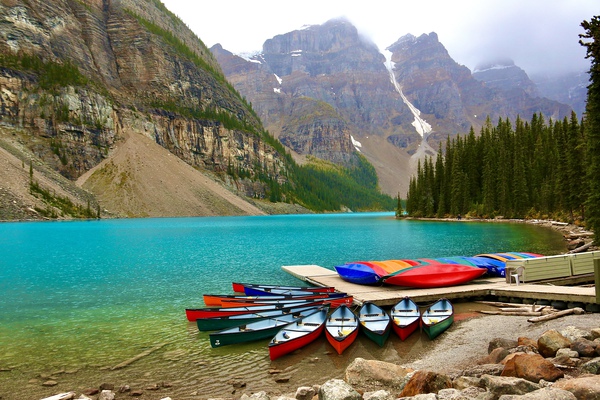 Canoes On Moraine Lake by DB Photos