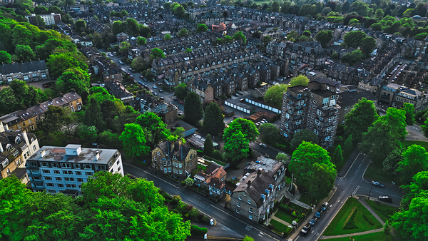 Aerial view of residential neighborhood with greenery in Harrogate North Yorkshire by Vasile Jechiu