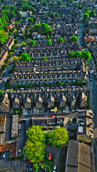 Aerial view of residential neighborhood with rows of houses in Harrogate North Yorkshire by Vasile Jechiu