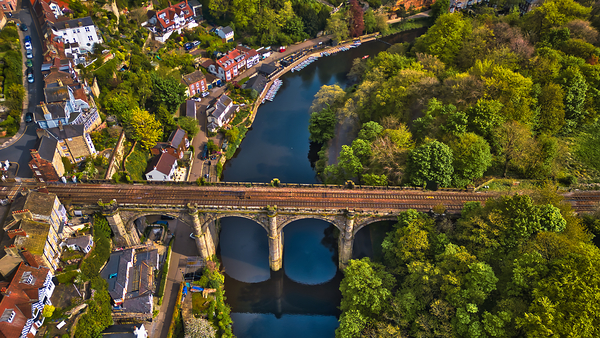 Scenic River Town with Stone Bridge in Knaresborough Yorkshire by Vasile Jechiu