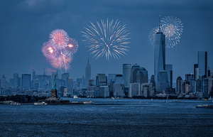 Statue of Liberty and Freedom Tower During Fireworks
