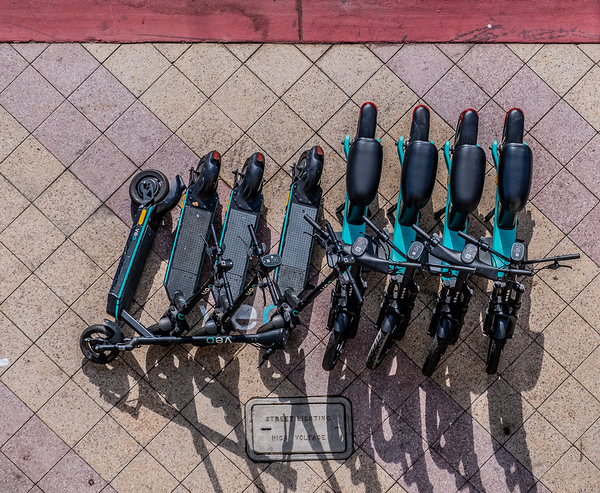 Rental Scooters on Sidewalk from Above Print