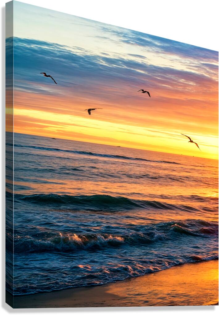 Sunset Over Gentle Waves At The Beach Canvas Print