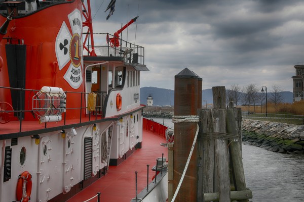 Red Boat and Lighthouse by Kaye