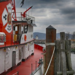 Red Boat and Lighthouse