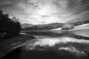 Clouds hang over a lake - Derbyshire - England