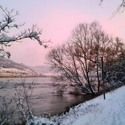 Snowy Sunset On Riversite