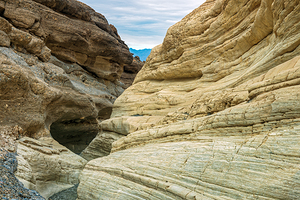 A narrow hiking trail between the walls of Mosaic Canyon in Death Valley National Park California USA