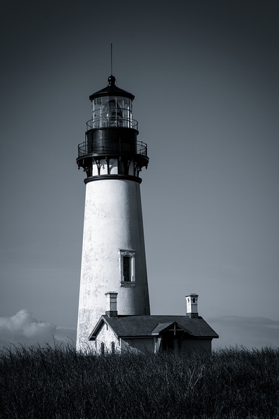 Yaquina Head Lighthouse on the Oregon Coast in Black and White by Kathleen Reed