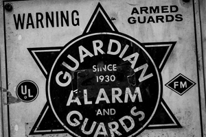 guardian alarm sign  horizontal 535 Armed 13k