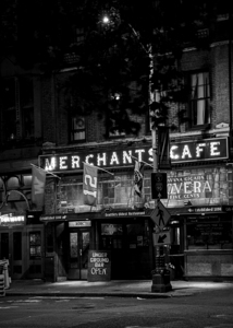 merchants cafe at night pioneer square  vertical