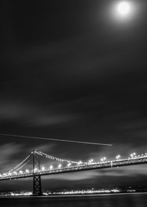 plane over bay bridge night full moon  vertical 2