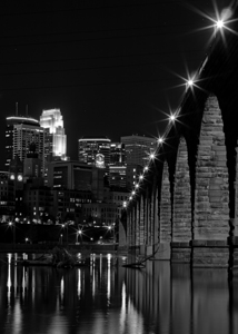 stone arch bridge minneapolis skyline  vertical 1