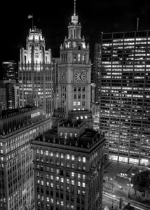 wrigley building clock face at night  vertical 25