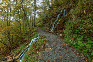 Passing Between Waterfalls