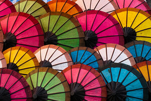 Multicolored umbrellas on the Luang Prabang market