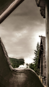 Yellowstone Old Faithful Inn Porch and Geyser