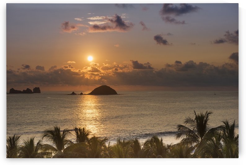 Sunset over the islands in front of Ixtapa; Ixtapa, Mexico by PacificStock
