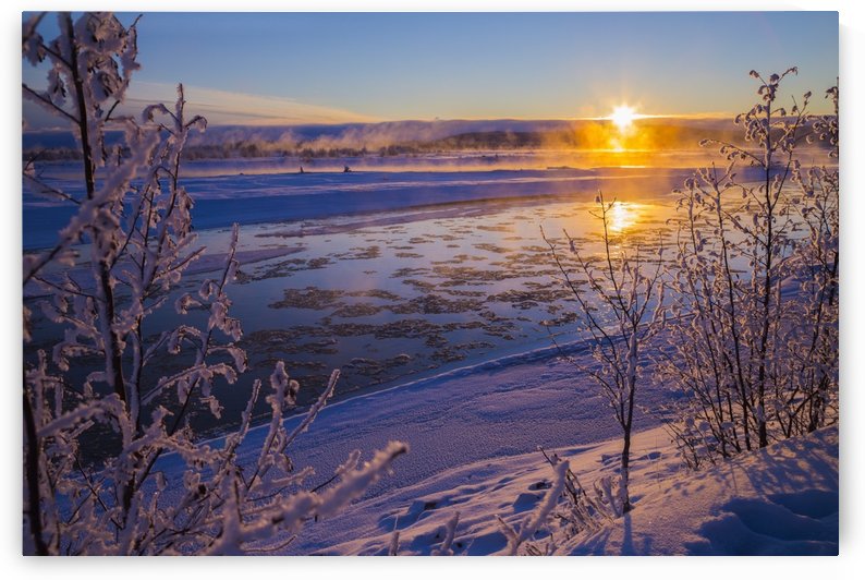Ice flows in the Tanana River at sunset during freeze up in early winter; Alaska, United States of America by PacificStock
