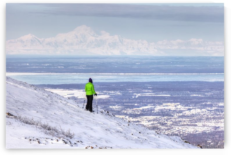 Woman snowshoer taking in the view of Mt. McKinley (Denali) from Blueberry Hill at the Glen Alps area of Chugach State Park, Anchorage, Southcentral Alaska, Winter, HDR by PacificStock