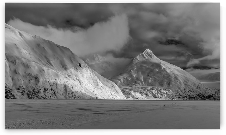 Hikers make the trek to Portage Glacier on Portage Lake in winter, South-central Alaska; Alaska, United States of America by PacificStock