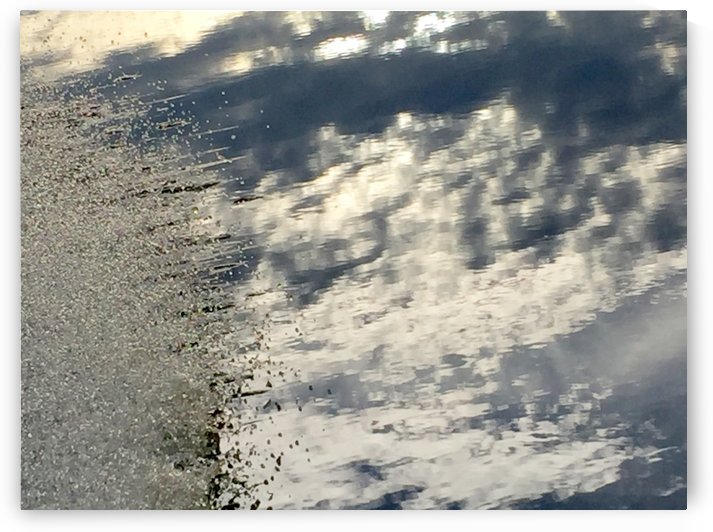 Sky Reflected In Water With Movement by Maria Virginia Castro