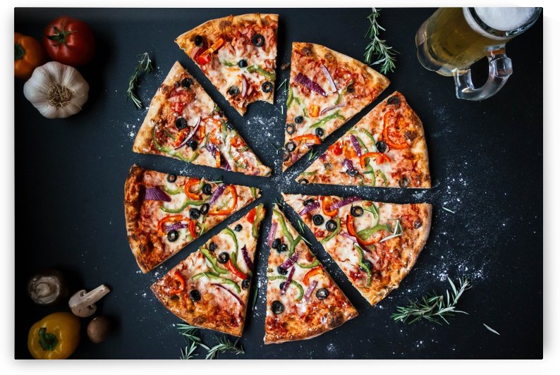 Baked Pizza on Top of Black Surface Near Filled Glass Tankard by Azlan