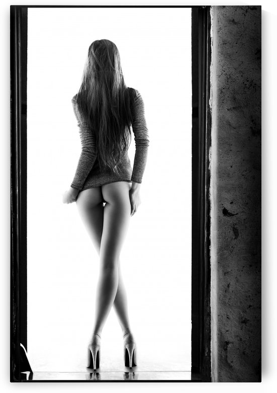 Woman standing in doorway by Johan Swanepoel