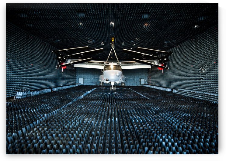 A CV-22 Osprey hangs in the anechoic chamber at Eglin Air Force Base. by StocktrekImages