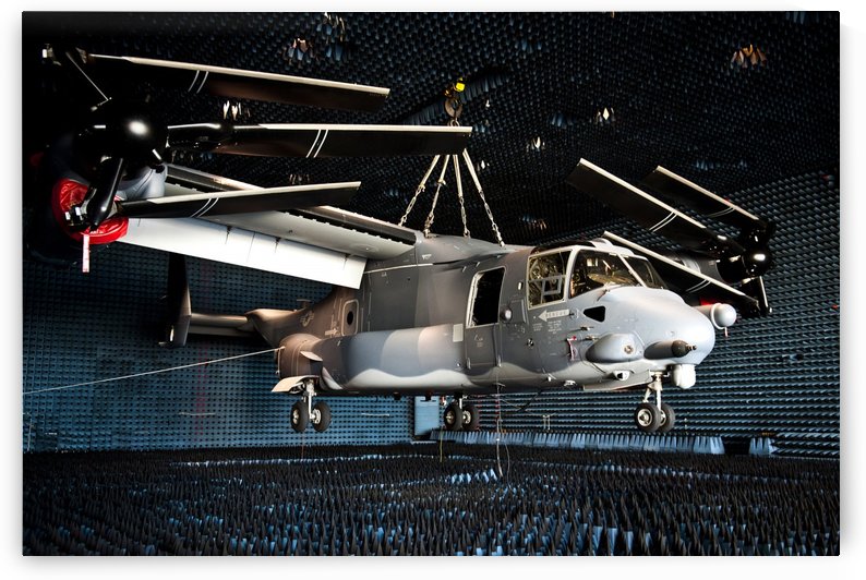 A CV-22 Osprey hangs in a anechoic chamber. by StocktrekImages