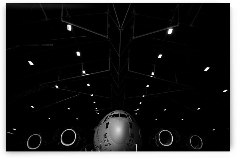 A C-17 Globemaster III sits in a hangar at McChord Field Air Force Base Washington. by StocktrekImages