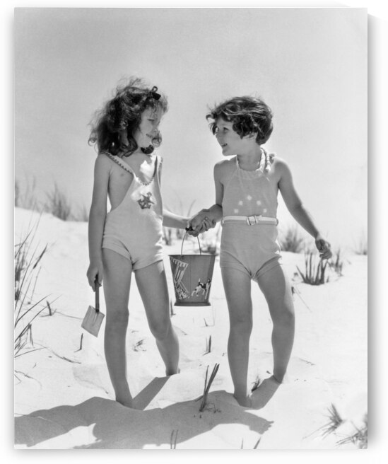 1930s TWO FRIENDS HOLDING HANDS ON THE BEACH 177431 by Panoramic Images