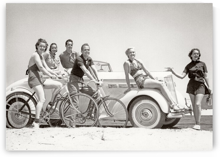 1930s MEN AND WOMEN ON BICYCLES IN A CAR ON BEACH 232719 by Panoramic Images