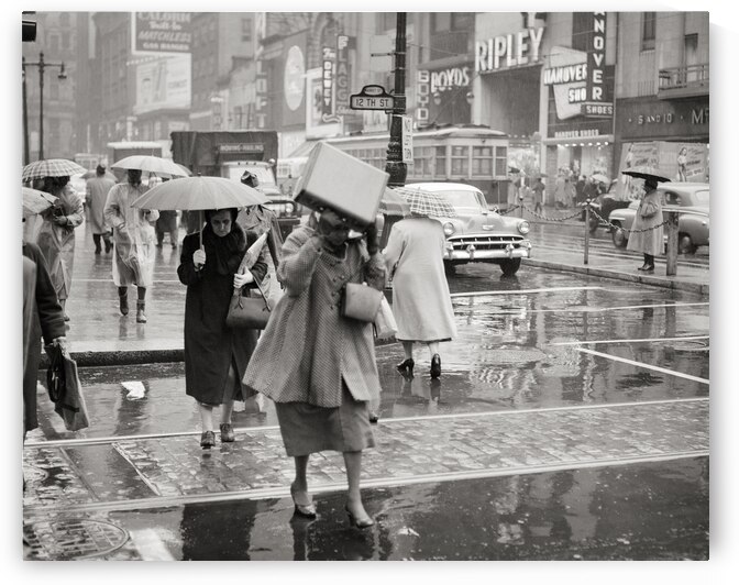 1950s WOMAN HOLDING BOX SUDDEN RAIN STORM PHILA PA 232631 by Panoramic Images