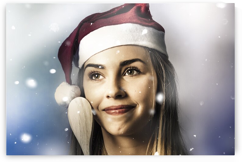 Christmas woman cooking up winter food idea by Jorgo