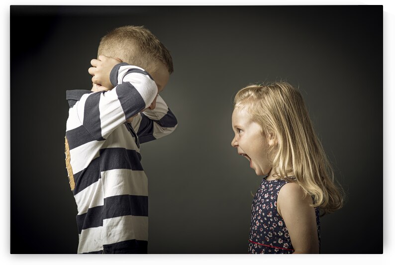child screams and child plugs his ears  by Gualtiero Boffi